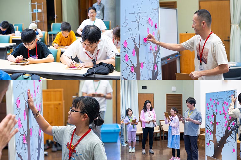 ひとりひとりが感想を書き込んだ「桜」を、荘川桜に見立てた桜の木のボードに貼っていきました